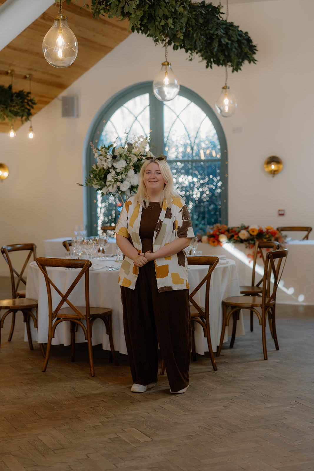A blonde haired woman talking to another woman at Broxmouth Courtyard.